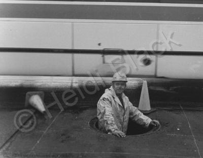 Around Dayton - Man In A Manhole - Bw Photography 35Mm