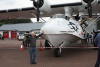 Private - Ewen Patting An Historic Icon In Oban - Photography